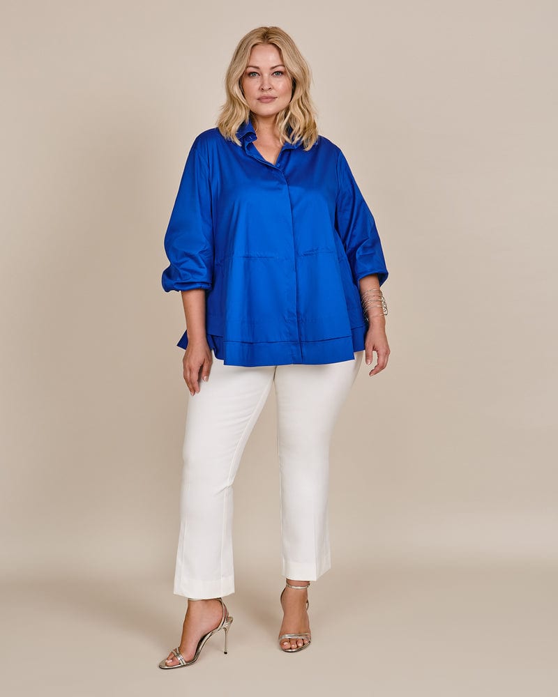 Front of a model wearing a size 2 WIKI Blouse in Electric Blue by WINGATE. | dia_product_style_image_id:227991